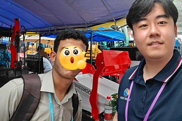 Loongsheen team presenting excavator and skid steer loader solutions at expo