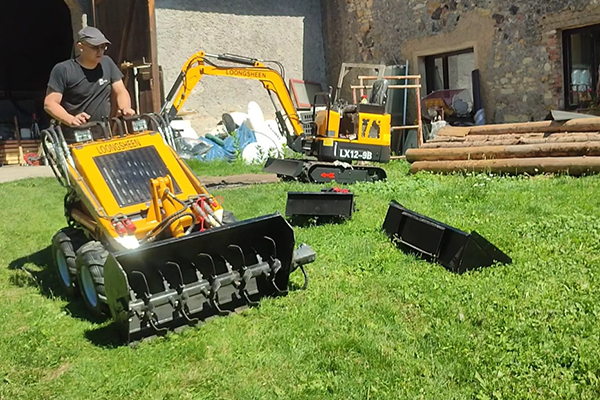 Tracked mini dumper on grass jobsite for landscaping and farm material transport