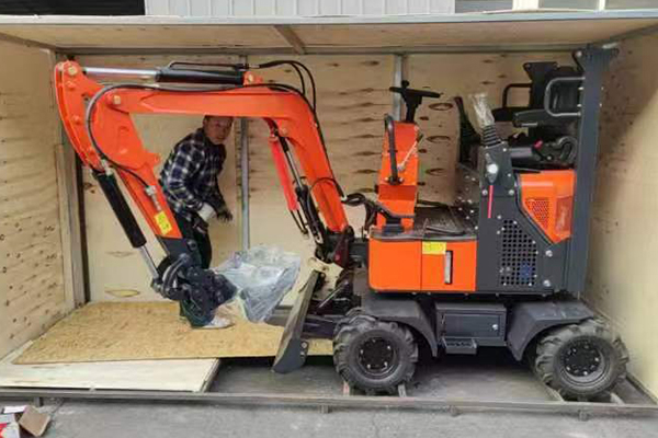 Mini excavator loaded in crate for safe ocean freight worldwide delivery